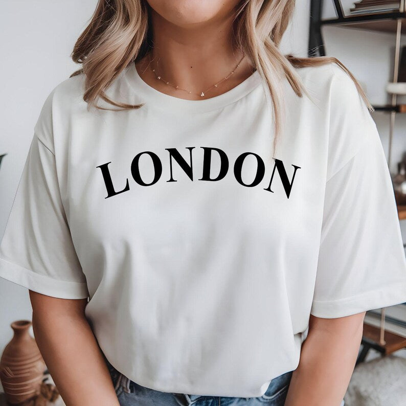 Custom City Name T Shirt designed for travel lovers, city explorers, holiday enthusiasts, and anyone who wants to celebrate a meaningful location through personalised fashion. This minimalist typography shirt can be customised with any city, town, country, destination, or special place, making it perfect for travellers, families, couples, friends, and individuals who appreciate stylish personalised clothing with personal significance and lasting memories.