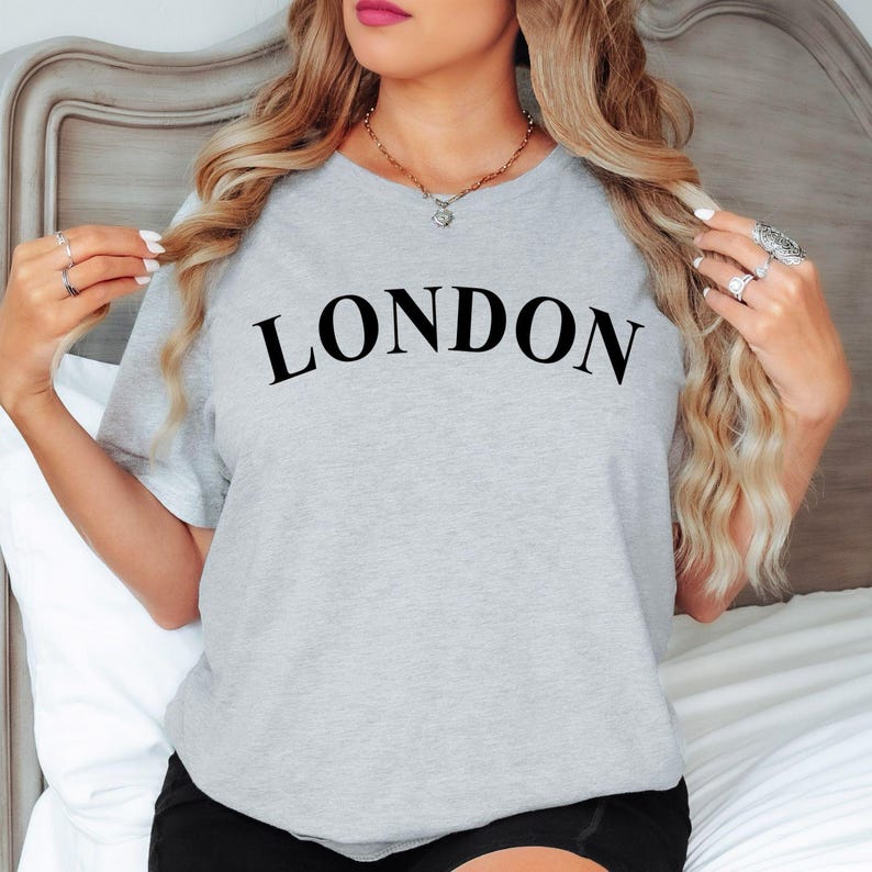 Custom City Name T Shirt perfect for holidays, city breaks, travel adventures, family vacations, birthdays, anniversaries, weekend trips, sightseeing tours, and special occasions. The minimalist typography design creates a stylish and versatile look while highlighting a meaningful location. Suitable for gifting or personal wear, it offers comfort, individuality, and a memorable connection to favourite places.