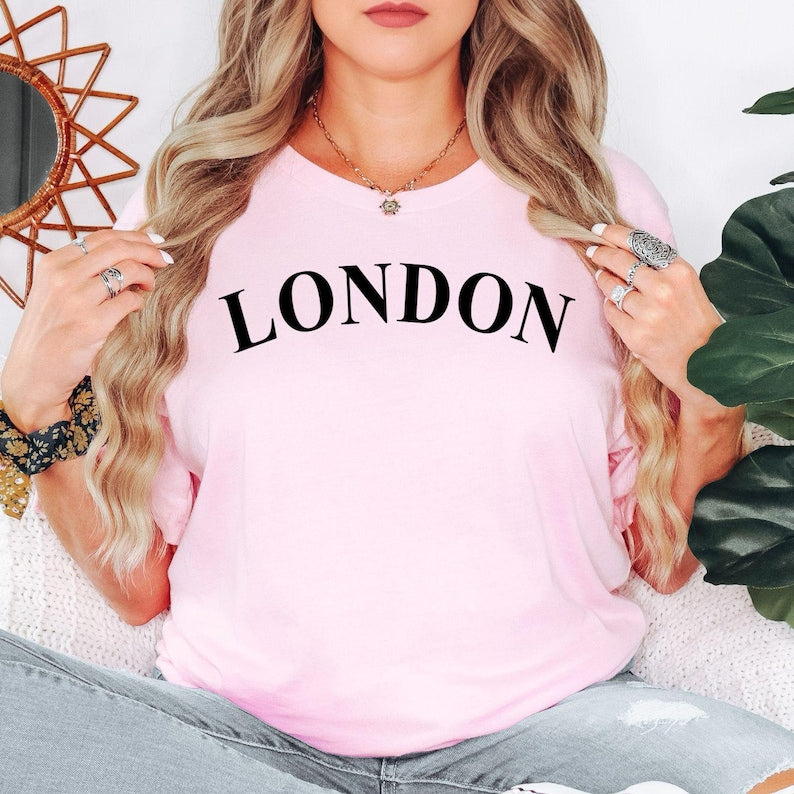 Beautiful custom city name t shirt designed as a meaningful gift for travel lovers, family members, partners, friends, and loved ones. Featuring personalised location text and a clean minimalist design, this premium shirt makes a perfect birthday gift, anniversary gift, holiday present, travel keepsake, or personalised surprise. A thoughtful gift that celebrates favourite destinations and unforgettable memories.