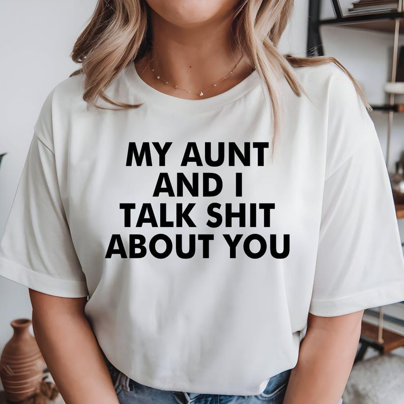 Funny Aunt Shirt, My Aunt And I Talk Shit About You Shirt, Aunt T Shirt, Sarcastic Family Tee, Funny Family Shirt, Aunt Gift, Gift For Aunt, Niece Gift, Nephew Gift, Family Quote Shirt, Funny Quote Tee, Novelty Graphic Shirt, Statement T Shirt, Typography Tee, Humour Apparel, Witty Quote Shirt, Premium Graphic Tee, Casual Funny Clothing, Family Humour Shirt, Bold Quote Tee, Conversation Starter Shirt, Funny Saying Tee, Unisex Graphic Shirt, Family Gift.
