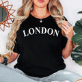Custom City Name T Shirt designed for travel lovers, city explorers, holiday enthusiasts, and anyone who wants to celebrate a meaningful location through personalised fashion. This minimalist typography shirt can be customised with any city, town, country, destination, or special place, making it perfect for travellers, families, couples, friends, and individuals who appreciate stylish personalised clothing with personal significance and lasting memories.
