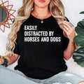 Funny Horse Lover Shirt, Easily Distracted By Horses And Dogs Shirt, Horse Lover T Shirt, Dog Lover Tee, Equestrian Shirt, Horse Riding Shirt, Pet Lover Clothing, Funny Animal Shirt, Stable Life Tee, Farm Life Shirt, Horse Mom Shirt, Dog Mom Tee, Horse Dad Shirt, Dog Dad Shirt, Animal Lover Tee, Equestrian Gift, Horse Gift, Dog Gift, Premium Graphic T Shirt, Casual Animal Lover Clothing, Funny Typography Shirt, Horse Rider Tee, Pet Parent Shirt, Farm Lover Tee.