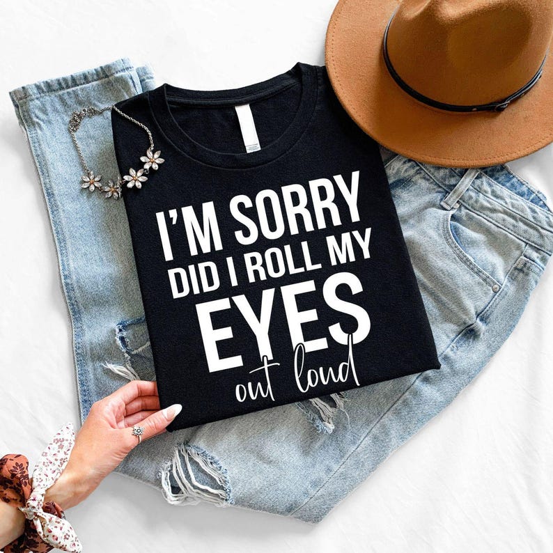 Searching for the perfect gift for someone with a sharp sense of humour? This I'm Sorry Did I Roll My Eyes Out Loud t shirt combines a bold typography layout with one of the funniest sarcastic quotes to create a premium statement tee. Professionally printed on a high-quality unisex t shirt, it offers exceptional comfort, durability, and everyday style. Perfect for birthdays, Christmas, office parties, girls' weekends, casual outings, Secret Santa gifts, and anyone who loves clever sarcasm.