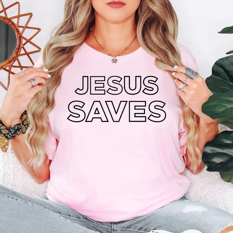 Jesus Saves t shirt makes a meaningful gift for pastors, church leaders, youth pastors, missionaries, worship teams, Bible study members, Christian mums, Christian dads, husbands, wives, sons, daughters, grandparents, friends, and anyone who loves Jesus. This premium Christian graphic shirt is perfect for birthdays, Easter, Christmas, baptisms, confirmations, ministry appreciation gifts, church events, and faith-filled celebrations.