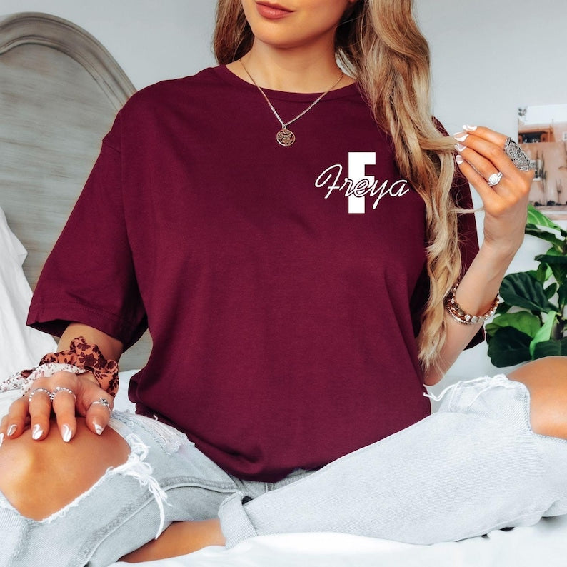 Comfortable personalised t shirt suitable for daily wear, holidays, shopping, travelling, relaxing at home, casual outings and weekend activities. The elegant monogram design adds a fashionable personalised touch while maintaining a clean minimalist aesthetic that pairs effortlessly with a wide range of clothing styles and accessories.