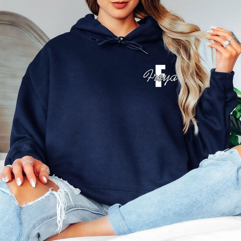 Custom initial hoodie designed as a thoughtful personalised gift for birthdays, Christmas, Mother's Day, bridesmaids, best friends, sisters, daughters and family members. The personalised letter and name design creates a meaningful keepsake that combines comfort, fashion and personal sentiment in one unique gift idea.