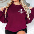 Custom name sweatshirt created for women, teens, mums, daughters, sisters, girlfriends, wives, best friends, students, and personalised clothing enthusiasts. A unique initial letter jumper designed for anyone who loves customised fashion and meaningful gifts.