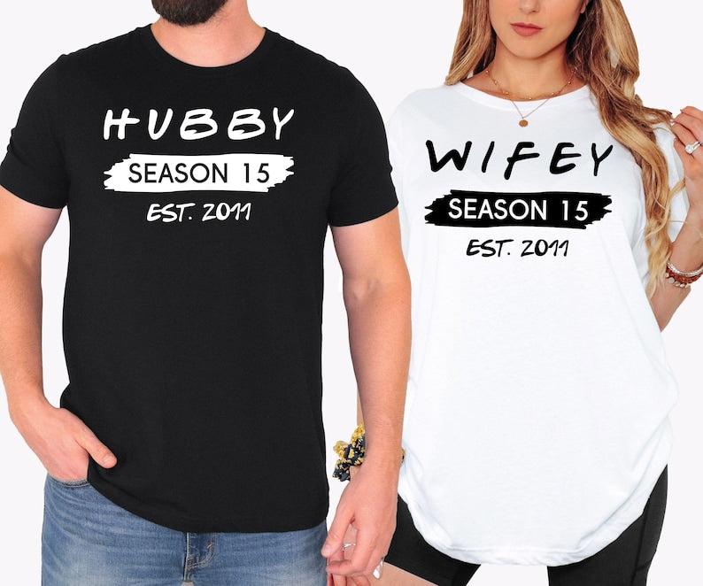 Personalised Hubby Wifey Family Matching T Shirts created for husbands, wives, parents, couples, newlyweds, and families celebrating love and togetherness. Featuring custom Hubby and Wifey text with personalised season number and established year, this premium matching Family Tee from Teezora Prints offers exceptional comfort, premium print quality, and stylish everyday fashion for anniversaries, family photos, holidays, and memorable matching moments.