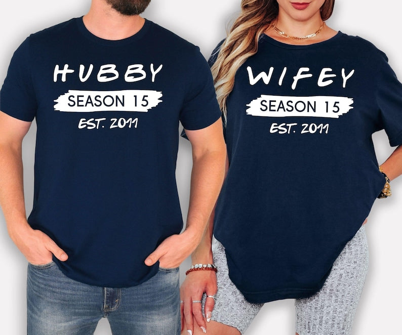 Personalised Hubby Wifey Family Matching T Shirts featuring custom season number and personalised established year designed for couples and families who love matching outfits. Teezora Prints offers premium personalised apparel for customers searching custom couple shirts, matching family tees, personalised anniversary clothing, husband wife matching shirts, wedding anniversary gifts, family celebration outfits, and unique personalised matching apparel.