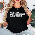 Funny sarcastic quote t shirt with Everyone Was Thinking It I Just Said It slogan printed in bold black typography on a premium unisex white t shirt. Perfect humorous graphic tee for everyday wear, casual outfits, office humour, witty fashion, novelty clothing, funny gifts for men and women, minimalist statement shirt and modern typography apparel.