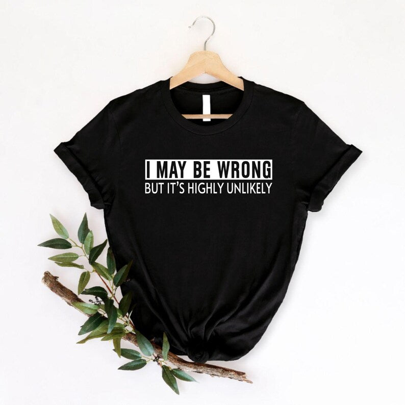 Funny sarcastic t shirt designed for men and women who enjoy witty humour, clever comebacks, and confident personalities. Featuring the quote "I May Be Wrong But It's Highly Unlikely" in a bold typography design, this premium graphic tee is perfect for friends, family, colleagues, husbands, wives, and anyone who enjoys playful sarcasm. A stylish everyday shirt for humour lovers who appreciate clever statements and comfortable casual fashion.