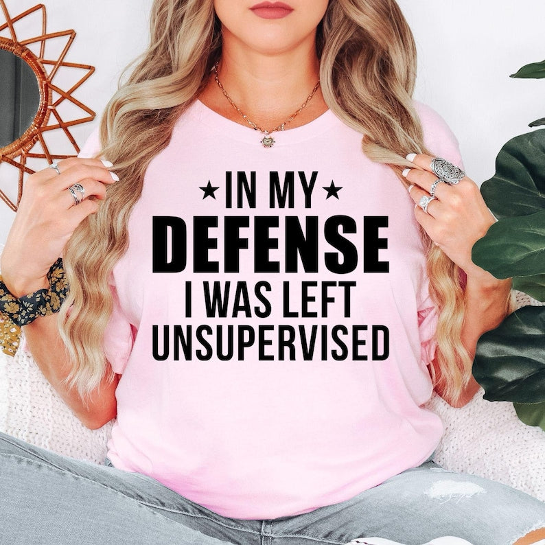 In My Defense I Was Left Unsupervised T Shirt makes a hilarious gift for husbands, wives, brothers, sisters, mums, dads, friends, coworkers, teachers, nurses, office staff, bosses, sons, daughters, and anyone famous for getting into funny situations. Designed by Teezora Prints, this premium graphic shirt is ideal for birthdays, Christmas, Father's Day, Mother's Day, retirement parties, Secret Santa, office celebrations, and memorable novelty gift giving.