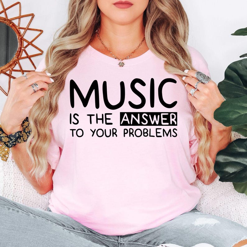 Music Is The Answer To Your Problems t shirt makes a thoughtful gift for musicians, singers, DJs, producers, music teachers, choir members, orchestra players, guitarists, pianists, drummers, students, family members, friends, and anyone who believes music solves everything. This premium graphic shirt is perfect for birthdays, Christmas, graduations, teacher appreciation, music recitals, concerts, festivals, and memorable gifts for passionate music lovers.