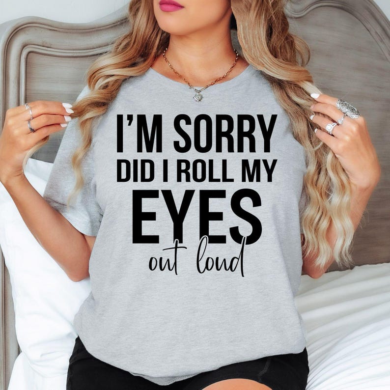 I'm Sorry Did I Roll My Eyes Out Loud t shirt is perfect for office parties, casual Fridays, girls' weekends, family gatherings, birthdays, shopping trips, holidays, brunch dates, coffee meetups, work events, school runs, vacations, festivals, everyday casual wear, and social occasions. The bold typography design creates an instant conversation starter while celebrating confidence, witty humour, sarcasm, and fearless self-expression.
