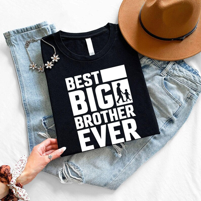 Best Big Brother Ever T Shirt featuring a bold typography design with a heartwarming sibling silhouette graphic. This premium printed t shirt celebrates the special relationship between siblings and is ideal for proud big brothers. Professionally printed in the UK using durable printing technology for long-lasting quality and everyday comfort.