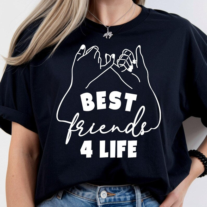 Looking for the perfect matching gift for your best friend? This Best Friends 4 Life T Shirt from Teezora Prints features a beautiful pinky promise design with bold typography that symbolises lifelong friendship. Professionally printed on a premium quality unisex t shirt, it's perfect for birthdays, Christmas, Friendship Day, girls' trips, sleepovers, holidays, and matching outfits for best friends.