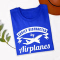 Easily Distracted By Airplanes t shirt makes a memorable gift for pilots, aviation students, cabin crew, aerospace engineers, aircraft mechanics, travellers, plane spotters, flight instructors, airport workers, aviation photographers, family members, friends, and anyone fascinated by flying. This premium graphic shirt is perfect for birthdays, Christmas, Father's Day, Mother's Day, pilot graduation, aviation club events, retirement celebrations, and thoughtful gifts for airplane lovers.