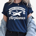 Funny Airplane Shirt, Easily Distracted By Airplanes Shirt, Aviation T Shirt, Pilot Shirt, Airplane Lover Tee, Aircraft Shirt, Plane Spotter Shirt, Aviation Enthusiast Tee, Travel Shirt, Airport Lover Shirt, Cabin Crew Gift, Pilot Gift, Aircraft Graphic Tee, Flying Shirt, Aviation Gift, Aerospace Shirt, Aviation Clothing, Premium Graphic Tee, Casual Aviation Apparel, Airplane Fan Shirt, Flight Lover Tee, Aviation Fashion, Unisex Pilot Shirt, Aircraft Lover Clothing.