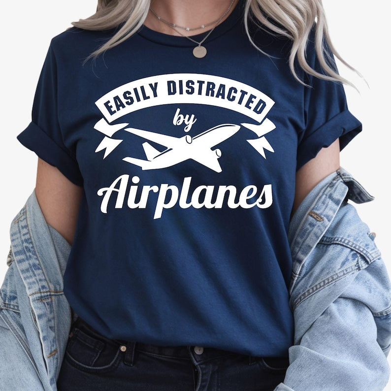 Funny Airplane Shirt, Easily Distracted By Airplanes Shirt, Aviation T Shirt, Pilot Shirt, Airplane Lover Tee, Aircraft Shirt, Plane Spotter Shirt, Aviation Enthusiast Tee, Travel Shirt, Airport Lover Shirt, Cabin Crew Gift, Pilot Gift, Aircraft Graphic Tee, Flying Shirt, Aviation Gift, Aerospace Shirt, Aviation Clothing, Premium Graphic Tee, Casual Aviation Apparel, Airplane Fan Shirt, Flight Lover Tee, Aviation Fashion, Unisex Pilot Shirt, Aircraft Lover Clothing.