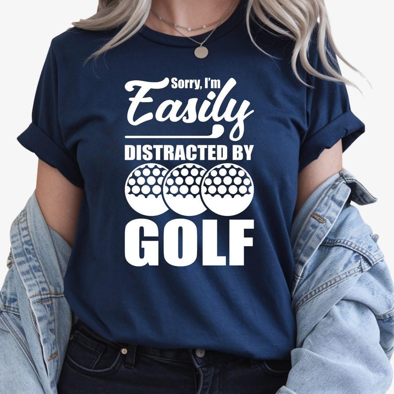Teezora Prints Funny Golf Shirt, Sorry I'm Easily Distracted By Golf Shirt, Golf Lover T Shirt, Golfer Tee, Golf Ball Shirt, Golf Quote Tee, Golfing Shirt, Golf Player Shirt, Golf Dad Shirt, Golf Mum Shirt, Golf Gift, Golf Tournament Shirt, Golf Club Shirt, Golf Apparel, Funny Sports Shirt, Premium Golf Tee, Casual Golf Clothing, Golf Fan Shirt, Unisex Golf T Shirt, Golf Graphic Tee, Golfer Gift, Golf Fashion Shirt, Golf Course Clothing, Weekend Golfer Apparel.