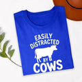 Perfect for farm visits, agricultural shows, livestock exhibitions, countryside holidays, ranch work, outdoor adventures, farmers' markets, county fairs and casual everyday wear. This funny cow lover shirt blends comfort with personality, while every order is professionally printed in the UK by TeezoraPrints using premium-quality printing for long-lasting wear.