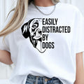 Perfect for dog lovers, pet parents, dog mums, dog dads and animal enthusiasts, this Easily Distracted by Dogs shirt features a playful dog illustration with a bold graphic slogan that captures every dog lover's personality. Whether you're out walking your pup or relaxing with your furry friend, this premium t-shirt delivers comfort and style. Professionally printed in the UK by TeezoraPrints using high-quality materials.
