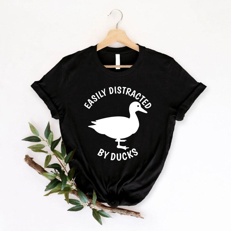 Funny duck lover shirt designed for bird enthusiasts, wildlife lovers, animal fans and outdoor adventurers. Ideal for parks, lakes, nature reserves, bird watching, countryside trips and weekend outings. Every premium graphic t-shirt is professionally printed in the UK by TeezoraPrints, providing vibrant colours, comfort and lasting quality.