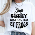 Perfect for frog lovers, amphibian enthusiasts, wildlife fans and nature explorers, this Easily Distracted by Frogs shirt features a bold frog illustration with retro-inspired typography for a fun everyday look. Whether you're exploring forests, visiting ponds or enjoying outdoor adventures, this premium t-shirt offers exceptional comfort. Professionally printed in the UK by TeezoraPrints using premium-quality materials.