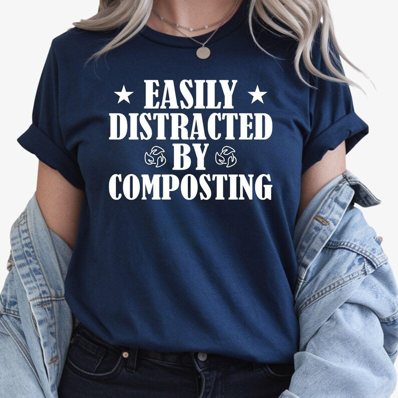 Easily Distracted by Composting shirt, funny gardening t shirt, compost lover tee, gardener gift, allotment shirt, eco-friendly clothing, sustainable living apparel, organic gardening shirt, plant lover gift, humorous gardening top and novelty compost graphic tee. Professionally printed in the UK by TeezoraPrints using premium cotton for superior comfort and everyday wear.