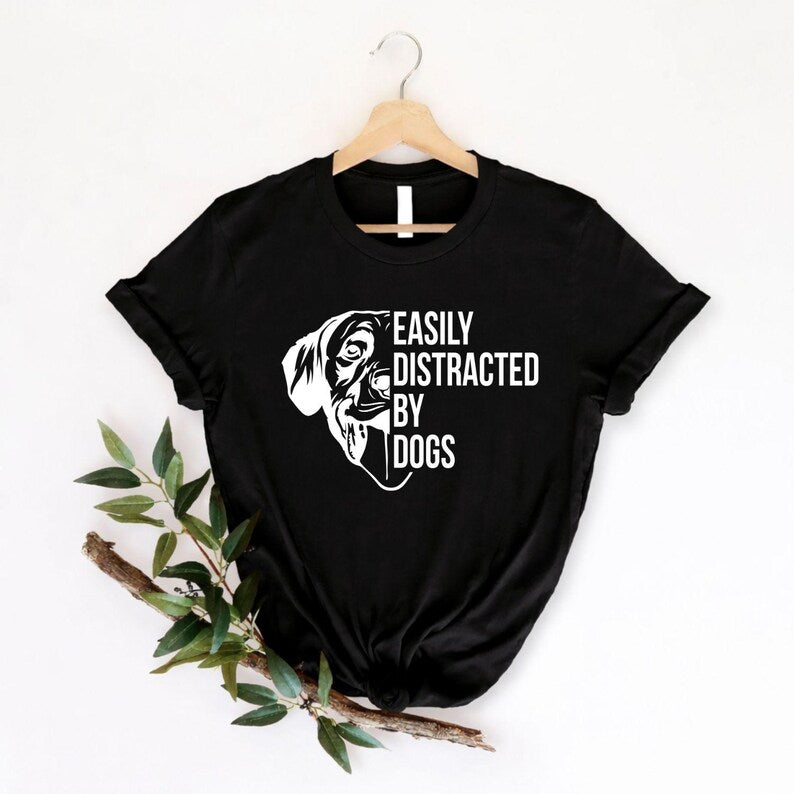 Funny dog lover shirt designed for pet owners, puppy lovers, dog mums, dog dads and canine enthusiasts. Perfect for dog parks, pet-friendly cafés, training sessions, countryside walks, family outings and weekend adventures. Every premium graphic tee is carefully printed in the UK by TeezoraPrints, combining stylish design with excellent comfort and durability.
