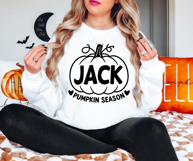 Personalised Pumpkin Season sweatshirt featuring a custom printed name and bold pumpkin artwork, designed as a fun autumn jumper for pumpkin picking, Halloween celebrations, seasonal photographs and cooler days. This personalised sweatshirt is a thoughtful custom clothing gift for mums, sisters, friends, daughters and anyone who enjoys autumn traditions and pumpkin season.