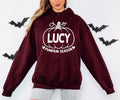 Personalised autumn hoodie with a custom name displayed inside a pumpkin illustration and Pumpkin Season wording. Designed as a cosy seasonal clothing choice for pumpkin picking, Halloween events, autumn celebrations and casual everyday wear. A unique personalised gift idea for pumpkin lovers, family members, friends, mums, sisters or anyone who enjoys the autumn season.