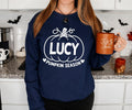 Personalised autumn sweatshirt with a chosen name displayed inside a pumpkin illustration and Pumpkin Season wording. Ideal for wearing during pumpkin picking, Halloween parties, autumn walks, family gatherings and seasonal photoshoots. This custom sweatshirt offers a fun way to celebrate the season and makes a memorable personalised gift for friends, family members and pumpkin enthusiasts.