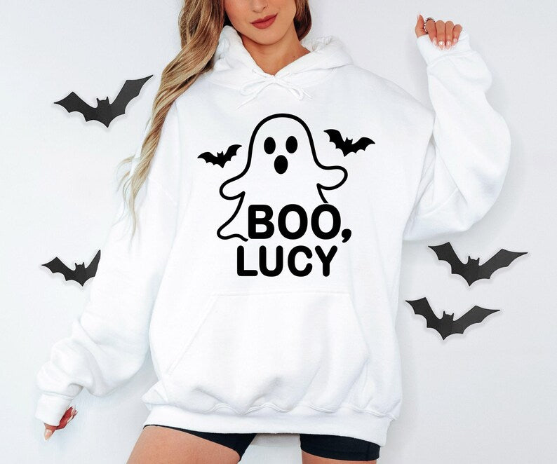Personalised Boo Halloween hoodie featuring a cute ghost design with a custom name printed underneath, surrounded by spooky bat details, perfect for Halloween parties, trick or treating, autumn celebrations, personalised Halloween outfits and fun spooky season clothing gifts.