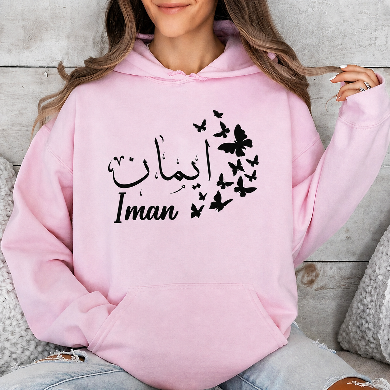 Personalised Arabic Name Butterfly Hoodie featuring beautifully detailed butterfly artwork surrounding elegant custom Arabic calligraphy. The delicate butterfly design adds a feminine and graceful touch while enhancing the personalised Arabic name styling. Perfect for customers searching butterfly hoodies, Arabic calligraphy clothing, personalised Islamic fashion, custom Arabic gifts, Muslim women apparel, and unique personalised garments that combine elegance, symbolism, and modern fashion trends.
